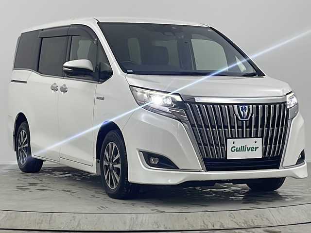 トヨタ エスクァイア ハイブリッド Gi 熊本県 2018(平30)年 4.3万km ホワイトパールクリスタルシャイン 社外メモリナビ/バックカメラ/両側パワースライドドア/クルーズコントロール/LEDヘッドライト/シートヒーター/純正15インチアルミホイール/フリップダウンモニター/ドライブレコーダー/ビルトインETC