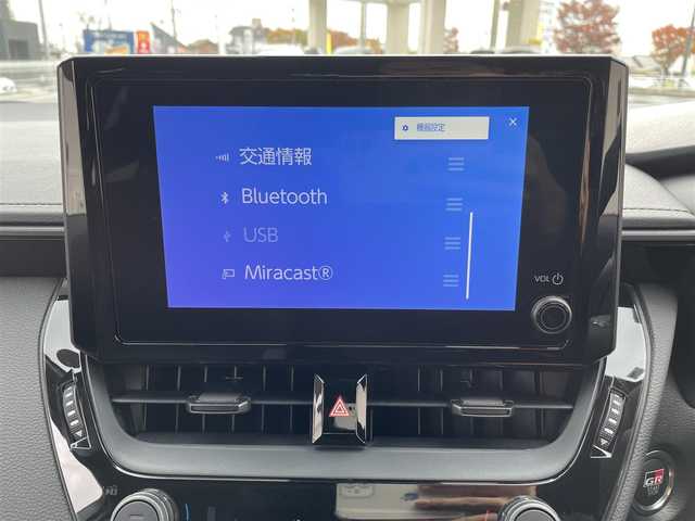 トヨタ ＧＲカローラ RZ 三重県 2025(令7)年 0.1千km ガンＭ 登録時44km/ユーザー買取車/ワンオーナー/禁煙車/6速MT/GR仕様シート/JBLサウンド/純正ナビ/（AM/FM/TV/Bluetooth）/フルセグTV/バックカメラ/ビルトインETC2.0/ステアリングスイッチ/レーダークルーズコントロール/シートヒーター/オートライト/オートハイビーム/プリクラッシュセーフティ/レーンディパーチャーアラート/BSM/HUD/コーナーセンサー/純正フロアマット/スペアキー