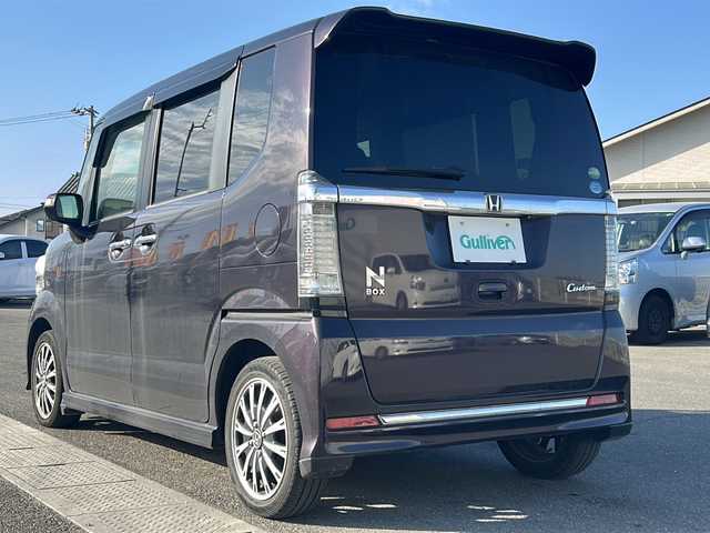 ホンダ Ｎ ＢＯＸ カスタム G ターボSSパッケージ 香川県 2016(平28)年 7.9万km プレミアムベルベットパープル・パール 社外ナビ（フルセグTV/CD/DVD/BT)/バックカメラ/シートヒーター/両側パワースライドドア/HIDヘッドライト/ビルトインETC/両側後席テーブル