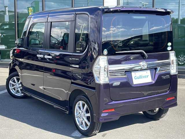 ダイハツ タント カスタム X トップED SA 道東・釧路十勝 2015(平27)年 6万km ナイトシャドーパープルクリスタルM ・4WD/・純正8インチナビ/（AM・FM・CD・DVD・ipod・SD・フルセグ）/・バックモニター/・片側パワースライドドア/・後席純正フリップダウンモニター/・スマートアシスト/・低速域衝突回避支援ブレーキ機能/・誤発信抑制御機能j/・先行車発信お知らせ機能/・アイドリングストップ機能/・LEDヘッドランプ/・オートライト/・ステアリングスイッチ/・オートエアコン/・リアヒーターダクト/・皮ファブリックコンビシート/・シートリフター/・イモビライザー/・スマートキー/・プッシュスタート/・純正14インチアルミホイール