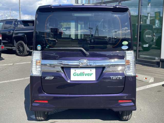 ダイハツ タント カスタム X トップED SA 道東・釧路十勝 2015(平27)年 6万km ナイトシャドーパープルクリスタルM ・4WD/・純正8インチナビ/（AM・FM・CD・DVD・ipod・SD・フルセグ）/・バックモニター/・片側パワースライドドア/・後席純正フリップダウンモニター/・スマートアシスト/・低速域衝突回避支援ブレーキ機能/・誤発信抑制御機能j/・先行車発信お知らせ機能/・アイドリングストップ機能/・LEDヘッドランプ/・オートライト/・ステアリングスイッチ/・オートエアコン/・リアヒーターダクト/・皮ファブリックコンビシート/・シートリフター/・イモビライザー/・スマートキー/・プッシュスタート/・純正14インチアルミホイール