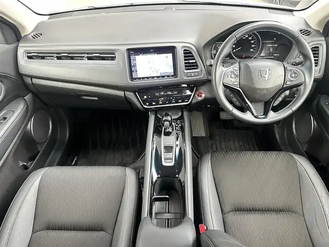 ホンダ ヴェゼル ハイブリッド Z ホンダセンシング 愛知県 2021(令3)年 4.5万km プラチナホワイトパール ・純正9インチナビ/・Bluetooth/・バックカメラ/・フルセグTV/・ホンダセンシング/・衝突被害軽減システム/・クルーズコントロール/・コーナーセンサー/・レーンキープアシスト/・オートライト/・LEDフォグランプ/・シートヒーター/・ETC/・純正AW/・純正フロアマット/・プッシュスタート/・スマートキー