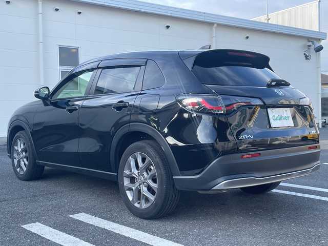 ホンダ ＺＲ－Ｖ ハイブリッド e:HEV X 三重県 2024(令6)年 1.3万km クリスタルブラックパール 登録時走行距離　１２６３２ｋｍ/禁煙/ワンオーナー/純正ナビ/AM/FM/TV/Bluetooth/USB/ワイヤレス充電/前後ドラレコ/電動パーキング/ブレーキホールド/全方位カメラ/前後コーナーセンサー/衝突軽減システム/レーンキープアシスト/先行者発進/BSM/RSA/レーダークルコン/パドルシフト/ステアリングスイッチ/ビルトインETC/パワーバックドア/パワーウィンドウ/AUTOライト/AUTOハイビーム/LED/プッシュスタート/スマートキー/純正ドアバイザー/純正フロアマット/スペアキー/USB充電/SOSスイッチ