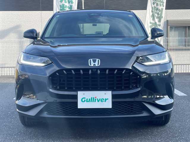 ホンダ ＺＲ－Ｖ ハイブリッド e:HEV X 三重県 2024(令6)年 1.3万km クリスタルブラックパール 登録時走行距離　１２６３２ｋｍ/禁煙/ワンオーナー/純正ナビ/AM/FM/TV/Bluetooth/USB/ワイヤレス充電/前後ドラレコ/電動パーキング/ブレーキホールド/全方位カメラ/前後コーナーセンサー/衝突軽減システム/レーンキープアシスト/先行者発進/BSM/RSA/レーダークルコン/パドルシフト/ステアリングスイッチ/ビルトインETC/パワーバックドア/パワーウィンドウ/AUTOライト/AUTOハイビーム/LED/プッシュスタート/スマートキー/純正ドアバイザー/純正フロアマット/スペアキー/USB充電/SOSスイッチ