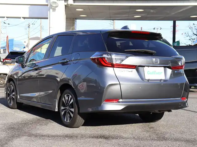 ホンダ シャトル ハイブリッド X ホンダセンシング 神奈川県 2021(令3)年 1.5万km シャイニンググレーM 純正メモリナビ/バックカメラ/Bluetooth/ナビ連動ドラレコ（前後）/アダプティブクルーズコントロール/ステアリングスイッチ/パドルシフト/プッシュスタート/ETC（ビルトイン）/USBジャック/LEDヘッドライト/シートヒーター（運転席、助手席）/保証書/スペアスマートキー