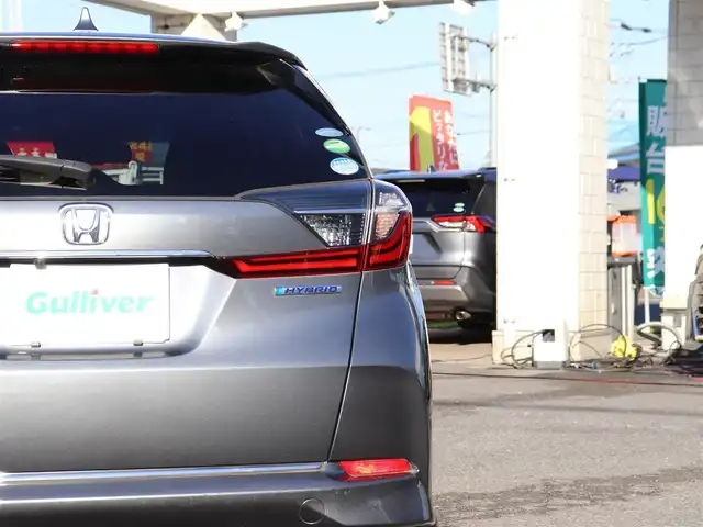 ホンダ シャトル ハイブリッド X ホンダセンシング 神奈川県 2021(令3)年 1.5万km シャイニンググレーM 純正メモリナビ/バックカメラ/Bluetooth/ナビ連動ドラレコ（前後）/アダプティブクルーズコントロール/ステアリングスイッチ/パドルシフト/プッシュスタート/ETC（ビルトイン）/USBジャック/LEDヘッドライト/シートヒーター（運転席、助手席）/保証書/スペアスマートキー