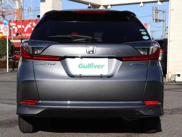 ホンダ シャトル ハイブリッド X ホンダセンシング 神奈川県 2021(令3)年 1.5万km シャイニンググレーM 純正メモリナビ/バックカメラ/Bluetooth/ナビ連動ドラレコ（前後）/アダプティブクルーズコントロール/ステアリングスイッチ/パドルシフト/プッシュスタート/ETC（ビルトイン）/USBジャック/LEDヘッドライト/シートヒーター（運転席、助手席）/保証書/スペアスマートキー