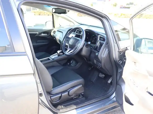 ホンダ シャトル ハイブリッド X ホンダセンシング 神奈川県 2021(令3)年 1.5万km シャイニンググレーM 純正メモリナビ/バックカメラ/Bluetooth/ナビ連動ドラレコ（前後）/アダプティブクルーズコントロール/ステアリングスイッチ/パドルシフト/プッシュスタート/ETC（ビルトイン）/USBジャック/LEDヘッドライト/シートヒーター（運転席、助手席）/保証書/スペアスマートキー