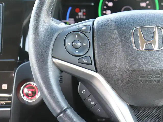 ホンダ シャトル ハイブリッド X ホンダセンシング 神奈川県 2021(令3)年 1.5万km シャイニンググレーM 純正メモリナビ/バックカメラ/Bluetooth/ナビ連動ドラレコ（前後）/アダプティブクルーズコントロール/ステアリングスイッチ/パドルシフト/プッシュスタート/ETC（ビルトイン）/USBジャック/LEDヘッドライト/シートヒーター（運転席、助手席）/保証書/スペアスマートキー