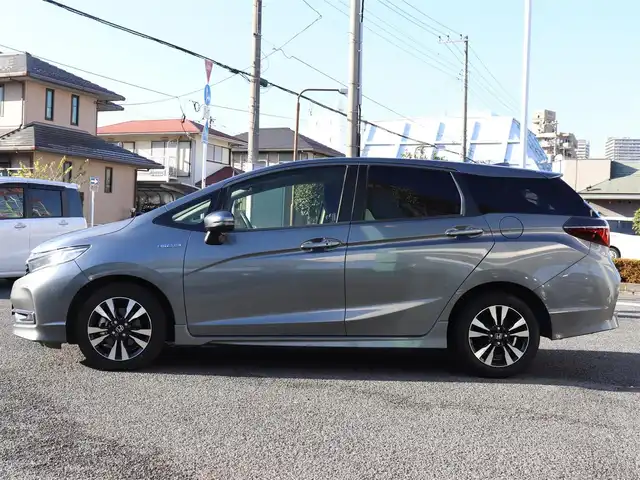 ホンダ シャトル ハイブリッド X ホンダセンシング 神奈川県 2021(令3)年 1.5万km シャイニンググレーM 純正メモリナビ/バックカメラ/Bluetooth/ナビ連動ドラレコ（前後）/アダプティブクルーズコントロール/ステアリングスイッチ/パドルシフト/プッシュスタート/ETC（ビルトイン）/USBジャック/LEDヘッドライト/シートヒーター（運転席、助手席）/保証書/スペアスマートキー