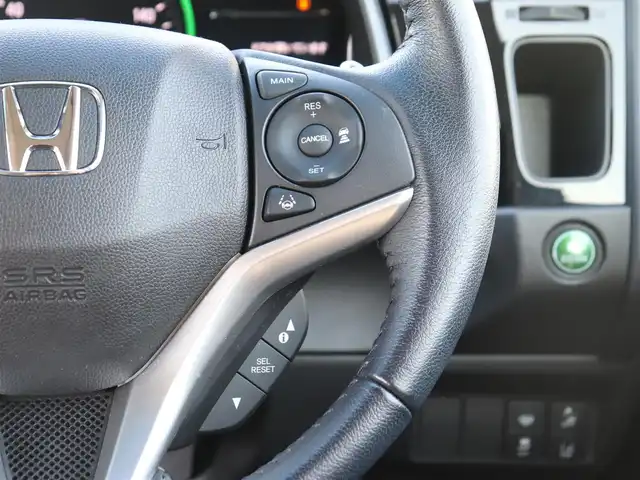 ホンダ シャトル ハイブリッド X ホンダセンシング 神奈川県 2021(令3)年 1.5万km シャイニンググレーM 純正メモリナビ/バックカメラ/Bluetooth/ナビ連動ドラレコ（前後）/アダプティブクルーズコントロール/ステアリングスイッチ/パドルシフト/プッシュスタート/ETC（ビルトイン）/USBジャック/LEDヘッドライト/シートヒーター（運転席、助手席）/保証書/スペアスマートキー