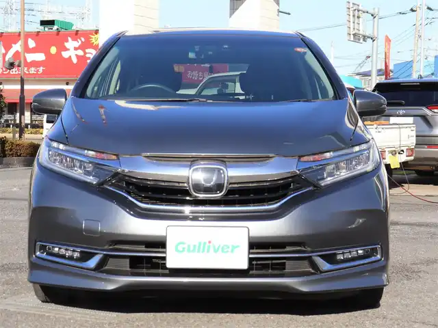 ホンダ シャトル ハイブリッド X ホンダセンシング 神奈川県 2021(令3)年 1.5万km シャイニンググレーM 純正メモリナビ/バックカメラ/Bluetooth/ナビ連動ドラレコ（前後）/アダプティブクルーズコントロール/ステアリングスイッチ/パドルシフト/プッシュスタート/ETC（ビルトイン）/USBジャック/LEDヘッドライト/シートヒーター（運転席、助手席）/保証書/スペアスマートキー