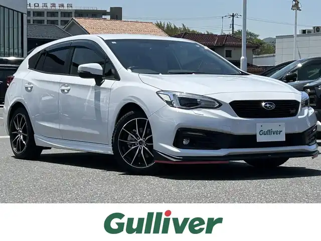 スバル インプレッサ スポーツ STI スポーツ 島根県 2021(令3)年 1.7万km セラミックホワイト 純正8インチナビ/CD/DVD/DTV/Bluetooth/バックカメラ/レーダークルーズコントロール/コーナーセンサー/ステアリングスイッチ/パワーシート/メモリーシート /アイドリングストップ/純正アルミホイール付きサマータイヤ積込/STIフロントスポイラー/STIルーフスポイラー/スマートキー/スペアキー /プッシュスタート /純正フロアマット/ドアバイザー/ETC