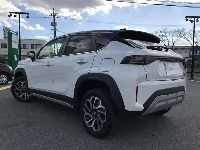 スズキ フロンクス 鳥取県 2024(令6)年 0.6万km パールⅡ ４・W・D/ツートンカラー/ルーフブラック/純正9インチナビ/フルセグ/BT/USB/HDMI/全方位モニター/スズキセーフティサポート/ブラインドスポットモニター/レーンキープアシスト/レーダークルーズコントロール/ヘッドアップディスプレイ/ETC/ハーフレザーシート/前席シートヒーター/置くだけ充電/LEDヘットライト/ハイビームアシスト/純正16インチアルミホイール/プッシュエンジンスタート/アイドリングストップ/スマートキー/フロアマット