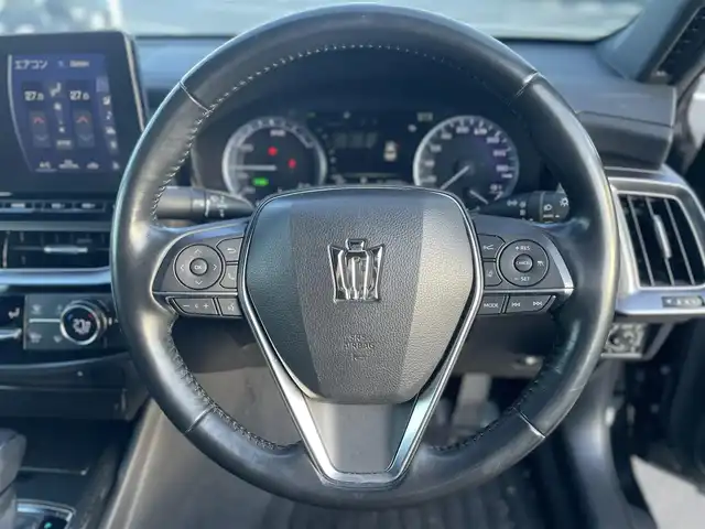 トヨタ クラウン ハイブリッド RS 岡山県 2021(令3)年 10.3万km ブラック 登録時走行距離：　102796km/禁煙車/後期モデル/純正12.3インチナビ/　(CD/DVD/フルセグTV/Bluetooth)/バックカメラ/クルーズコントロール(追従走行あり)/BSM/トヨタセーフティセンス/（PCS/LTA/RCTA/PKSB/RSA/クリアランスソナー）/ドライブレコーダー/ビルトインETC2.0/Clazzioレザー調シートカバー/ハーフレザーシート/シートヒーター/エアシート/パワーシート/ステアリングヒーター/革巻きステアリング/ステアリングスイッチ/純正LEDヘッドライト/フォグライト/オートライト/プッシュスタート/スマートキー/スペアキー×1/MTモード付きAT/アイドリングストップ/純正アルミホイール 18インチ/ウインカーミラー/電動格納ミラー/オートリトラミラー/純正フロアマット/横滑防止装置/盗難防止装置/取扱説明書/ナビ取扱説明書/新車時整備手帳（保証書）