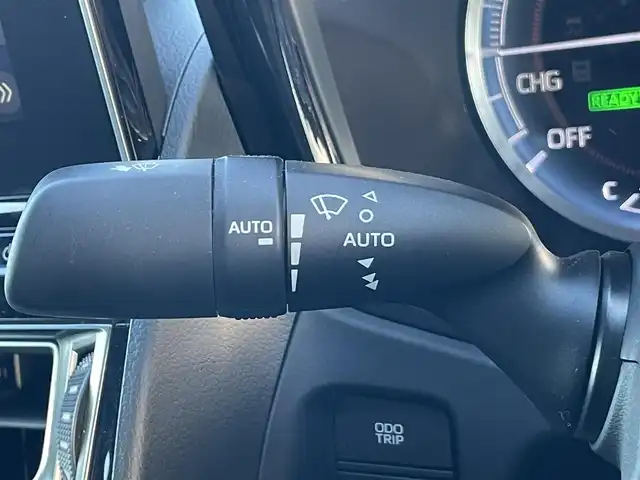 トヨタ クラウン ハイブリッド RS 岡山県 2021(令3)年 10.3万km ブラック 登録時走行距離：　102796km/禁煙車/後期モデル/純正12.3インチナビ/　(CD/DVD/フルセグTV/Bluetooth)/バックカメラ/クルーズコントロール(追従走行あり)/BSM/トヨタセーフティセンス/（PCS/LTA/RCTA/PKSB/RSA/クリアランスソナー）/ドライブレコーダー/ビルトインETC2.0/Clazzioレザー調シートカバー/ハーフレザーシート/シートヒーター/エアシート/パワーシート/ステアリングヒーター/革巻きステアリング/ステアリングスイッチ/純正LEDヘッドライト/フォグライト/オートライト/プッシュスタート/スマートキー/スペアキー×1/MTモード付きAT/アイドリングストップ/純正アルミホイール 18インチ/ウインカーミラー/電動格納ミラー/オートリトラミラー/純正フロアマット/横滑防止装置/盗難防止装置/取扱説明書/ナビ取扱説明書/新車時整備手帳（保証書）