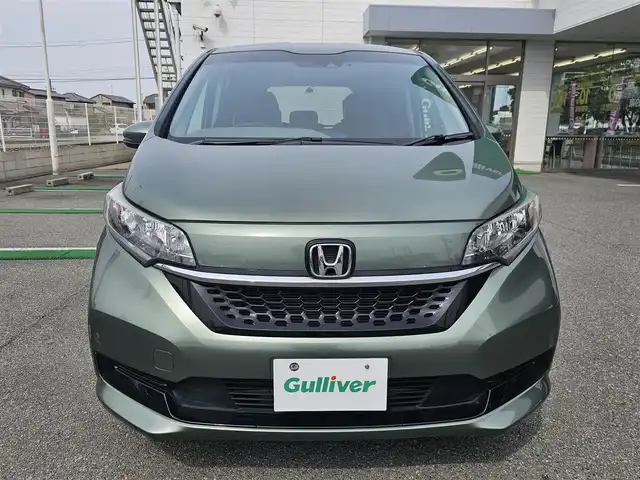 ホンダ フリード G ホンダセンシング 兵庫県 2020(令2)年 4.4万km シルバーミストグリーンM ワンオーナー/保証書・記録簿・取説・有/社外メモリーナビ・フルセグ・BT・CD・DVD・FM・AM/バックカメラ/ETC/前後ドライブレコーダー/追尾機能付きクルーズコントロール/車線逸脱防止支援システム/衝突被害軽減ブレーキ/両側パワースライドドア/アイドリングストップ/プッシュスタート/スマートキー×2/社外フロアマット