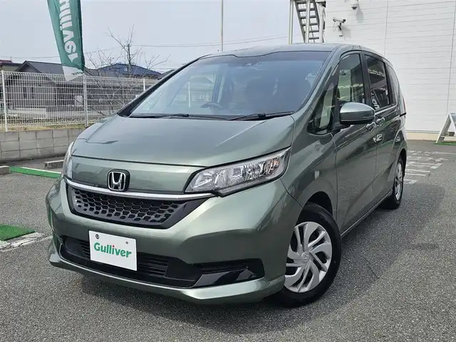 ホンダ フリード G ホンダセンシング 兵庫県 2020(令2)年 4.4万km シルバーミストグリーンM ワンオーナー/保証書・記録簿・取説・有/社外メモリーナビ・フルセグ・BT・CD・DVD・FM・AM/バックカメラ/ETC/前後ドライブレコーダー/追尾機能付きクルーズコントロール/車線逸脱防止支援システム/衝突被害軽減ブレーキ/両側パワースライドドア/アイドリングストップ/プッシュスタート/スマートキー×2/社外フロアマット