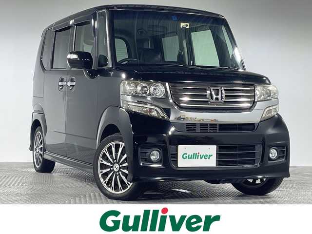 ホンダ Ｎ ＢＯＸ カスタム G ターボパッケージ 神奈川県 2013(平25)年 11.6万km クリスタルブラックパール 社外7型SDナビ/・CD/DVD/Bluetooth/フルセグ/ETC/バックカメラ/パドルシフト/革調シートカバー/両側電動スライドドア/革巻きハンドルノブ/電格ミラー/ドラレコ/HID/フォグ