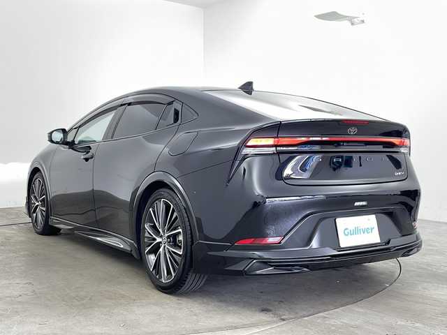 トヨタ プリウス Z 兵庫県 2023(令5)年 3.5万km アティチュードブラックマイカ ・純正ナビ/Bluetooth/TV/USB/Miracast/・全方位カメラ/・Toyota Safety Sense/・プリクラッシュセーフティ/・緊急時操舵支援（アクティブ操舵機能付）/・フロントクロストラフィックアラート［FCTA］/・レーンチェンジアシスト［LCA］/・レーントレーシングアシスト［LTA］/・レーンディパーチャーアラート［LDA］ /・レーダークルーズコントロール/・オートマチックハイビーム［AHB］ /・ロードサインアシスト［RSA］ /・ドライバー異常時対応システム /・プロアクティブドライビングアシスト［PDA］ /・発進遅れ告知機能［TMN］ /・ブラインドスポットモニター［BSM］ /・パーキングサポートブレーキ（前後方静止物）（後方接近車両）/・寒冷地仕様車/・クリアランスソナー/・オートマチックハイビーム/・デジタルインナーミラー/・パワートランク/・ステアリングヒーター/・革シート/・前席シートヒーター/・前席エアシート/・ナノイーX/・AC100V充電/・フロントワイパーデアイサー/・純正19インチアルミホイール/・LEDオートライト/・リアフォグ/・モデリスタエアロ/・ビルトインETC