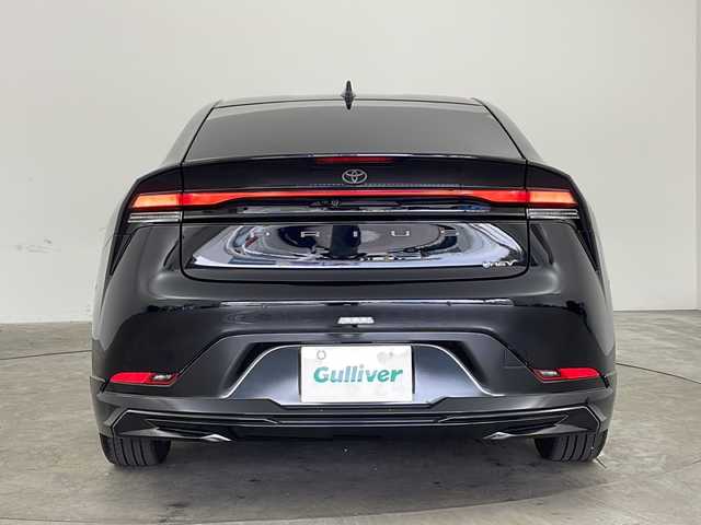 トヨタ プリウス Z 兵庫県 2023(令5)年 3.5万km アティチュードブラックマイカ ・純正ナビ/Bluetooth/TV/USB/Miracast/・全方位カメラ/・Toyota Safety Sense/・プリクラッシュセーフティ/・緊急時操舵支援（アクティブ操舵機能付）/・フロントクロストラフィックアラート［FCTA］/・レーンチェンジアシスト［LCA］/・レーントレーシングアシスト［LTA］/・レーンディパーチャーアラート［LDA］ /・レーダークルーズコントロール/・オートマチックハイビーム［AHB］ /・ロードサインアシスト［RSA］ /・ドライバー異常時対応システム /・プロアクティブドライビングアシスト［PDA］ /・発進遅れ告知機能［TMN］ /・ブラインドスポットモニター［BSM］ /・パーキングサポートブレーキ（前後方静止物）（後方接近車両）/・寒冷地仕様車/・クリアランスソナー/・オートマチックハイビーム/・デジタルインナーミラー/・パワートランク/・ステアリングヒーター/・革シート/・前席シートヒーター/・前席エアシート/・ナノイーX/・AC100V充電/・フロントワイパーデアイサー/・純正19インチアルミホイール/・LEDオートライト/・リアフォグ/・モデリスタエアロ/・ビルトインETC