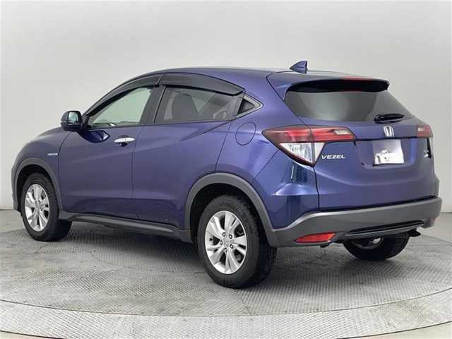 ホンダ ヴェゼル ハイブリッド X 道央・札幌 2015(平27)年 11.7万km モルフォブルーP (株)IDOMが運営する【じしゃロン札幌店】の自社ローン専用車両になりますこちらは現金またはオートローンご利用価格です。自社ローンご希望の方は別途その旨お申し付けください。・/・４WD/・寒冷地仕様/・シティーブレーキアクティブシステム/・リアクティブフォースペダル/・クルーズコントロール/・社外8インチナビ/・フルセグ/BT/CD/DVD/・バックカメラ/・パドルシフト/・ステアリングスイッチ/・フロントデアイサー/・ミラーヒーター/・オートブレーキホールド/・積込社外AW付夏タイヤ215/60R16
