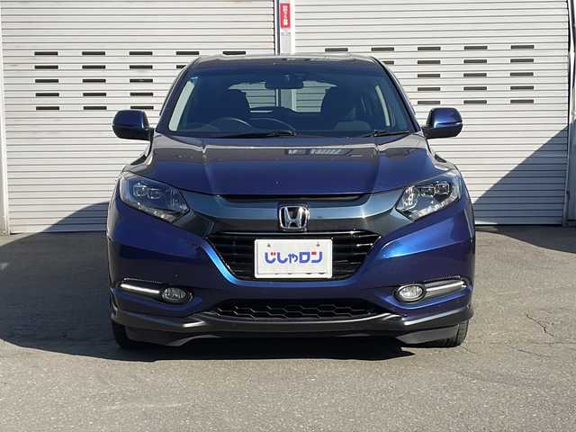 ホンダ ヴェゼル ハイブリッド X 道央・札幌 2015(平27)年 11.7万km モルフォブルーP (株)IDOMが運営する【じしゃロン札幌豊平店】の自社ローン対象車両になります。こちらは現金ご利用時の価格です。/自社ローンご希望の方は別途その旨お申付け下さい。/・４WD/・寒冷地仕様/・シティーブレーキアクティブシステム/・リアクティブフォースペダル/・クルーズコントロール/・社外8インチナビ/・フルセグ/BT/CD/DVD/・バックカメラ/・パドルシフト/・ステアリングスイッチ/・フロントデアイサー/・ミラーヒーター/・オートブレーキホールド/・積込社外AW付夏タイヤ215/60R16