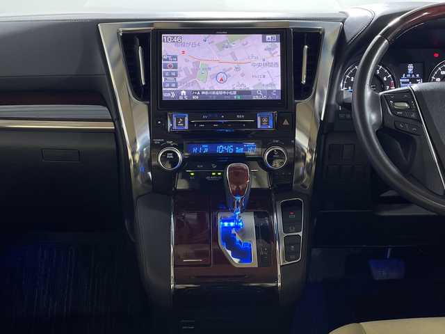 トヨタ ヴェルファイア V 神奈川県 2015(平27)年 7.3万km ホワイトパールクリスタルシャイン モデリスタエアロ【フロント/サイド/リア】/社外10型SDナビゲーション【EX10】/社外フリップダウンモニター/フルセグ　CD DVD　Bluetooth　SD　USB　HDMI/両側電動スライドドア【サンシェード】/パワーバックドア/クルーズコントロール/前後ソナー/木目調/革巻きコンビステアリング/ステアリングスイッチ/合皮/ファブリックコンビシート/前席パワーシート/運転席ポジションメモリー/助手席/2列目オットマン/ビルトインETC/社外前方ドライブレコーダー/電動パーキングブレーキ/オートブレーキホールド/プッシュスタート/スマートキー/LEDヘッド/フォグランプ/オートライト/電格ウインカーミラー