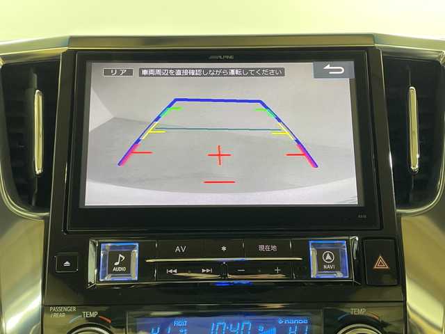 トヨタ ヴェルファイア V 神奈川県 2015(平27)年 7.3万km ホワイトパールクリスタルシャイン モデリスタエアロ【フロント/サイド/リア】/社外10型SDナビゲーション【EX10】/社外フリップダウンモニター/フルセグ　CD DVD　Bluetooth　SD　USB　HDMI/両側電動スライドドア【サンシェード】/パワーバックドア/クルーズコントロール/前後ソナー/木目調/革巻きコンビステアリング/ステアリングスイッチ/合皮/ファブリックコンビシート/前席パワーシート/運転席ポジションメモリー/助手席/2列目オットマン/ビルトインETC/社外前方ドライブレコーダー/電動パーキングブレーキ/オートブレーキホールド/プッシュスタート/スマートキー/LEDヘッド/フォグランプ/オートライト/電格ウインカーミラー