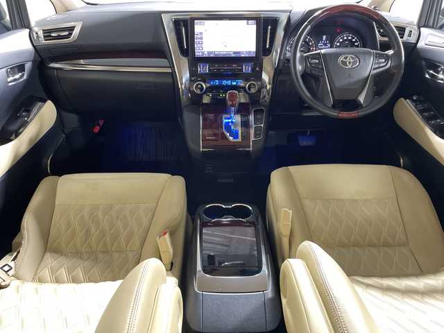 トヨタ ヴェルファイア V 神奈川県 2015(平27)年 7.3万km ホワイトパールクリスタルシャイン モデリスタエアロ【フロント/サイド/リア】/社外10型SDナビゲーション【EX10】/社外フリップダウンモニター/フルセグ　CD DVD　Bluetooth　SD　USB　HDMI/両側電動スライドドア【サンシェード】/パワーバックドア/クルーズコントロール/前後ソナー/木目調/革巻きコンビステアリング/ステアリングスイッチ/合皮/ファブリックコンビシート/前席パワーシート/運転席ポジションメモリー/助手席/2列目オットマン/ビルトインETC/社外前方ドライブレコーダー/電動パーキングブレーキ/オートブレーキホールド/プッシュスタート/スマートキー/LEDヘッド/フォグランプ/オートライト/電格ウインカーミラー