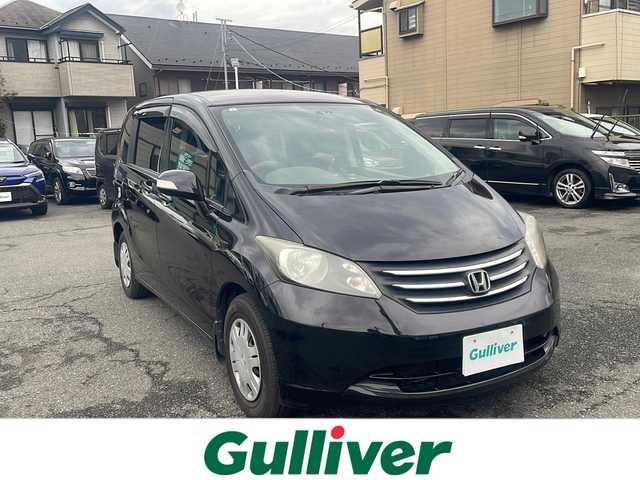 ホンダ フリード G ジャストセレクション 東京都 2010(平22)年 11.7万km プレミアムブラキッシュパール 純正ナビ/純正フロアマット/ドライブレコーダー/片側パワースライドドア（左側）/パワーウィンドウ/電動格納ミラー/ステアリングスイッチ/メーター照度調整スイッチ/シガーソケット/RCA入力端子/ビルトインETC/オートエアコン/三列シート/ウォークスルー
