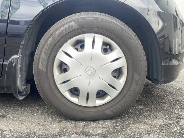 ホンダ フリード G ジャストセレクション 東京都 2010(平22)年 11.7万km プレミアムブラキッシュパール 純正ナビ/純正フロアマット/ドライブレコーダー/片側パワースライドドア（左側）/パワーウィンドウ/電動格納ミラー/ステアリングスイッチ/メーター照度調整スイッチ/シガーソケット/RCA入力端子/ビルトインETC/オートエアコン/三列シート/ウォークスルー