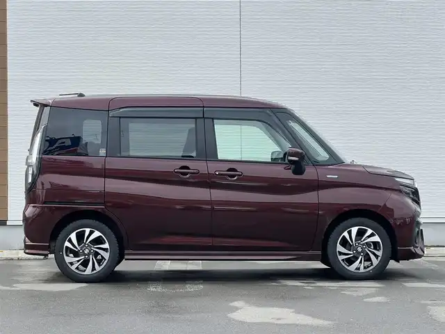 スズキ ソリオ バンディット HV MV 秋田県 2024(令6)年 1.1万km メロウディープレッドパール 純正ナビ・フルセグＴＶ・ＣＤ・DVD再生・Bluetooth・USB接続・AMFMチューナー/衝突被害軽減システム/コーナーセンサー/車線逸脱警報装置/フリップダウンモニター/前席シートヒーター/プッシュスタート・スマートキー/純正アルミホイール・スタッドレスタイヤ装着/LEDヘッドライト・フォグランプ/ダブル・サイド・カーテンエアバック/純正フロアマット/ウィンカーミラー