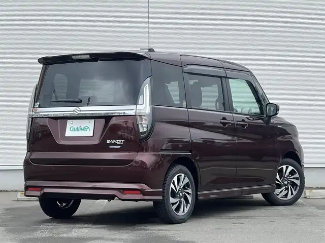 スズキ ソリオ バンディット HV MV 秋田県 2024(令6)年 1.1万km メロウディープレッドパール 純正ナビ・フルセグＴＶ・ＣＤ・DVD再生・Bluetooth・USB接続・AMFMチューナー/衝突被害軽減システム/コーナーセンサー/車線逸脱警報装置/フリップダウンモニター/前席シートヒーター/プッシュスタート・スマートキー/純正アルミホイール・スタッドレスタイヤ装着/LEDヘッドライト・フォグランプ/ダブル・サイド・カーテンエアバック/純正フロアマット/ウィンカーミラー