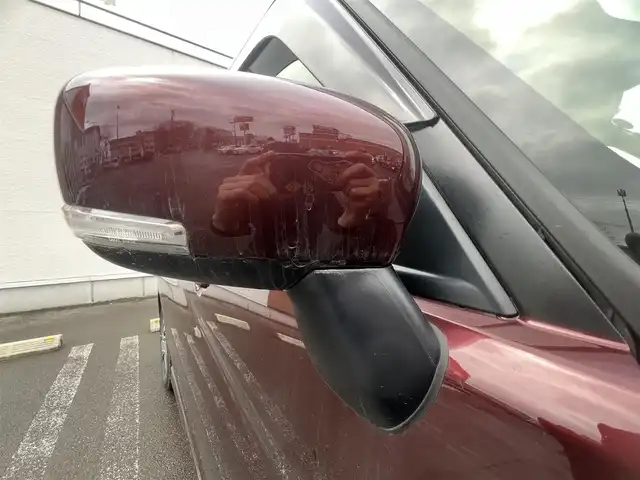 スズキ ソリオ バンディット HV MV 秋田県 2024(令6)年 1.1万km メロウディープレッドパール 純正ナビ・フルセグＴＶ・ＣＤ・DVD再生・Bluetooth・USB接続・AMFMチューナー/衝突被害軽減システム/コーナーセンサー/車線逸脱警報装置/フリップダウンモニター/前席シートヒーター/プッシュスタート・スマートキー/純正アルミホイール・スタッドレスタイヤ装着/LEDヘッドライト・フォグランプ/ダブル・サイド・カーテンエアバック/純正フロアマット/ウィンカーミラー