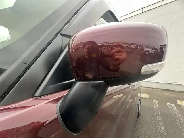 スズキ ソリオ バンディット HV MV 秋田県 2024(令6)年 1.1万km メロウディープレッドパール 純正ナビ・フルセグＴＶ・ＣＤ・DVD再生・Bluetooth・USB接続・AMFMチューナー/衝突被害軽減システム/コーナーセンサー/車線逸脱警報装置/フリップダウンモニター/前席シートヒーター/プッシュスタート・スマートキー/純正アルミホイール・スタッドレスタイヤ装着/LEDヘッドライト・フォグランプ/ダブル・サイド・カーテンエアバック/純正フロアマット/ウィンカーミラー