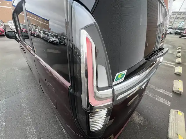 スズキ ソリオ バンディット HV MV 秋田県 2024(令6)年 1.1万km メロウディープレッドパール 純正ナビ・フルセグＴＶ・ＣＤ・DVD再生・Bluetooth・USB接続・AMFMチューナー/衝突被害軽減システム/コーナーセンサー/車線逸脱警報装置/フリップダウンモニター/前席シートヒーター/プッシュスタート・スマートキー/純正アルミホイール・スタッドレスタイヤ装着/LEDヘッドライト・フォグランプ/ダブル・サイド・カーテンエアバック/純正フロアマット/ウィンカーミラー