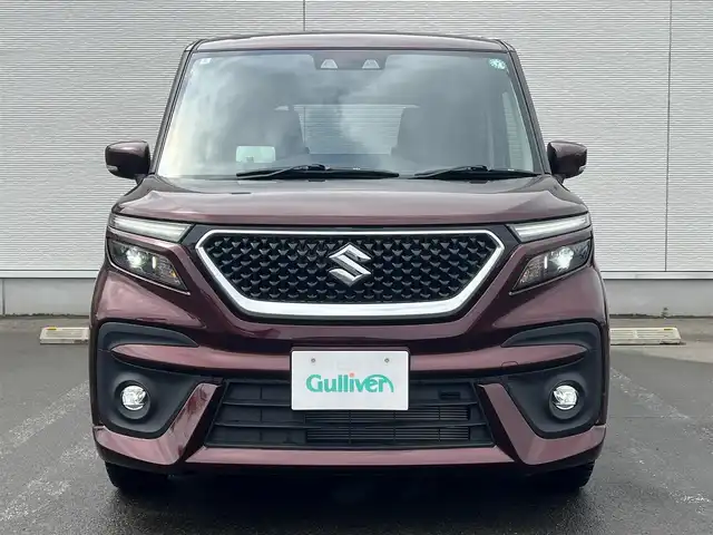 スズキ ソリオ バンディット HV MV 秋田県 2024(令6)年 1.1万km メロウディープレッドパール 純正ナビ・フルセグＴＶ・ＣＤ・DVD再生・Bluetooth・USB接続・AMFMチューナー/衝突被害軽減システム/コーナーセンサー/車線逸脱警報装置/フリップダウンモニター/前席シートヒーター/プッシュスタート・スマートキー/純正アルミホイール・スタッドレスタイヤ装着/LEDヘッドライト・フォグランプ/ダブル・サイド・カーテンエアバック/純正フロアマット/ウィンカーミラー