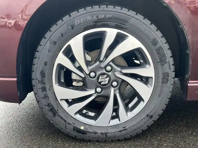 スズキ ソリオ バンディット HV MV 秋田県 2024(令6)年 1.1万km メロウディープレッドパール 純正ナビ・フルセグＴＶ・ＣＤ・DVD再生・Bluetooth・USB接続・AMFMチューナー/衝突被害軽減システム/コーナーセンサー/車線逸脱警報装置/フリップダウンモニター/前席シートヒーター/プッシュスタート・スマートキー/純正アルミホイール・スタッドレスタイヤ装着/LEDヘッドライト・フォグランプ/ダブル・サイド・カーテンエアバック/純正フロアマット/ウィンカーミラー