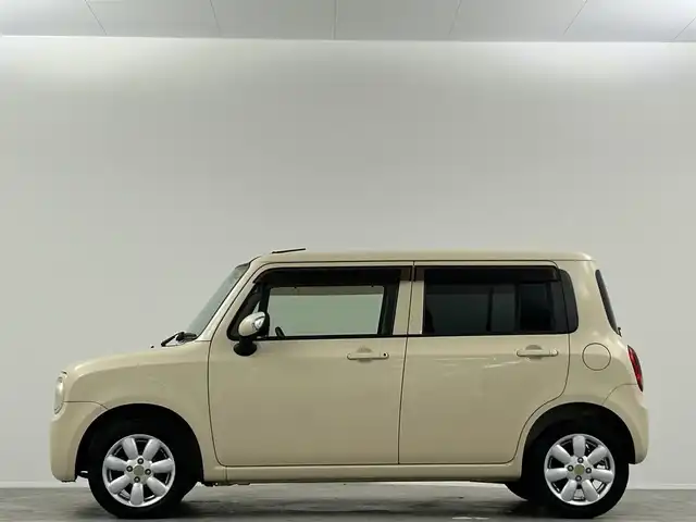 スズキ ラパン X 埼玉県 2010(平22)年 4万km ミルクティーベージュメタリック 純正オーディオ/AM FM CD/電動格納ミラー/純正フロアマット/純正アルミホイール/スマートキー×2/リアワイパー