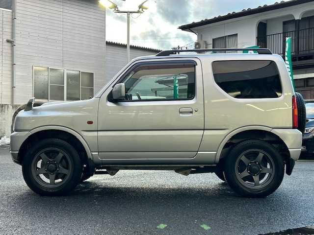 スズキ ジムニー XC 宮城県 2004(平16)年 7.6万km シルキーシルバーメタリック ターボ＆4WD/純正CD/電動格納ミラー/サイドミラーヒーター/ETC/リモコンキー/社外16インチアルミ/純正16インチアルミ＆ノーマルタイヤ積込/保証書/取扱説明書