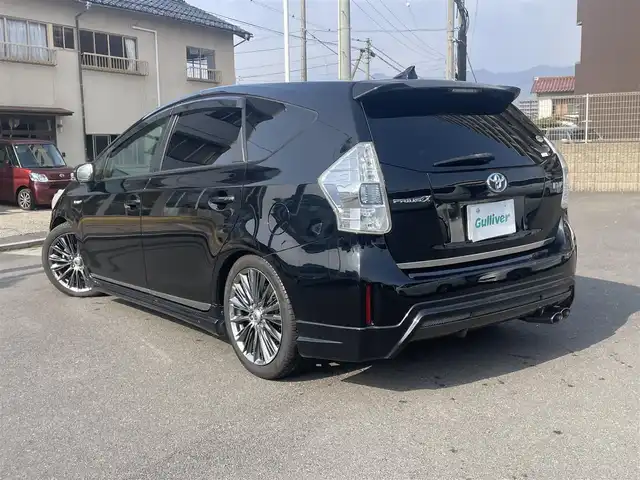 トヨタ プリウス α S 島根県 2012(平24)年 14.7万km ブラック アルパイン製９型メモリナビ　/フルセグＴＶ　/ＤＶＤ再生　/Ｂｌｕｅｔｏｏｔｈ接続　/フリップダウンモニター/ＥＴＣ　/バックカメラ　　/アイドリングストップ　/スマートキー　/プッシュスタート