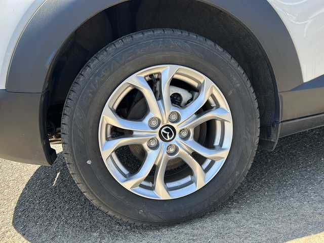 マツダ ＣＸ－３ 15S ツーリング 新潟県 2020(令2)年 1万km スノーフレイクホワイトパールマイカ 純正ナビ（CD・DVD・TV・BT）/コーナーセンサー/フロント・バックカメラ/ウインカーミラー/スマートキー/プッシュスタート/スマートシティブレーキサポート/パーキングセンター/インテリキー/３６０゜ビューモニター/横滑り防止装置/衝突被害軽減システム/レーンキープアシスト/パワーステアリング/パワーウィンドウ/アイドリングストップ/カーテンエアバック