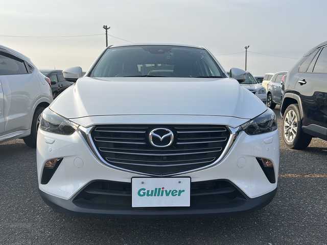 マツダ ＣＸ－３ 15S ツーリング 新潟県 2020(令2)年 1万km スノーフレイクホワイトパールマイカ 純正ナビ（CD・DVD・TV・BT）/コーナーセンサー/フロント・バックカメラ/ウインカーミラー/スマートキー/プッシュスタート/スマートシティブレーキサポート/パーキングセンター/インテリキー/３６０゜ビューモニター/横滑り防止装置/衝突被害軽減システム/レーンキープアシスト/パワーステアリング/パワーウィンドウ/アイドリングストップ/カーテンエアバック
