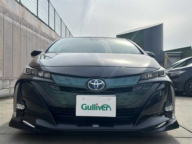 トヨタ プリウス ＰＨＶ A レザーパッケージ 愛知県 2017(平29)年 5.8万km アティチュードブラックマイカ 純正11.6型ナビ/TRDエアロ/社外１８インチアルミ/パワーシート/レーンキープアシスト/レーダークルーズコントロール/レザーシート/ステアリングヒーター/シートヒーター/オートライト/オートマチックハイビーム/純正LEDヘッドライト/ドラレコ/ビルトインETC2.0/スペアキー