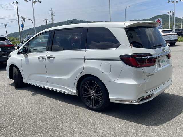 ホンダ オデッセイ アブソルート EX 兵庫県 2020(令2)年 6.9万km プラチナホワイトパール 純正10インチナビ/・AM FM　CD　DVD USB SD HDMI BT フルセグTV/純正11.6インチフリップダウンモニター/前後ドライブレコーダー/ETC2.0/全方位カメラ/BSM/全席シートヒーター/レーダークルーズコントロール/両側パワースライドドア/ハンズフリーパワーテールゲート/レーンアシスト/衝突軽減/前後コーナーセンサー/オートライト/パドルシフト/アイドリングストップ/純正フロアマット/純正18インチアルミホイール/LEDヘッドライト/カーテンエアバック/HDMI端子