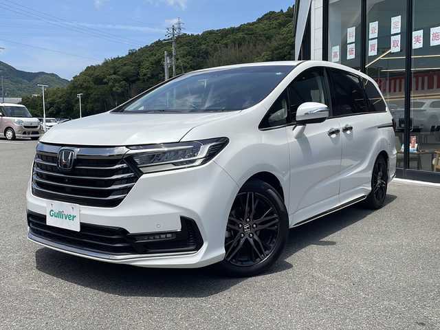ホンダ オデッセイ アブソルート EX 兵庫県 2020(令2)年 6.9万km プラチナホワイトパール 純正10インチナビ/・AM FM　CD　DVD USB SD HDMI BT フルセグTV/純正11.6インチフリップダウンモニター/前後ドライブレコーダー/ETC2.0/全方位カメラ/BSM/全席シートヒーター/レーダークルーズコントロール/両側パワースライドドア/ハンズフリーパワーテールゲート/レーンアシスト/衝突軽減/前後コーナーセンサー/オートライト/パドルシフト/アイドリングストップ/純正フロアマット/純正18インチアルミホイール/LEDヘッドライト/カーテンエアバック/HDMI端子