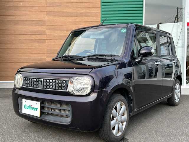 スズキ ラパン X セレクション 静岡県 2013(平25)年 1.8万km ミステリアスバイオレットパール 社外ナビ/シートヒーター/アイドリングストップ/スマートキー/プッシュスタート/盗難防止システム/純正フロアマット/純正アルミホイール/DVD再生機能有