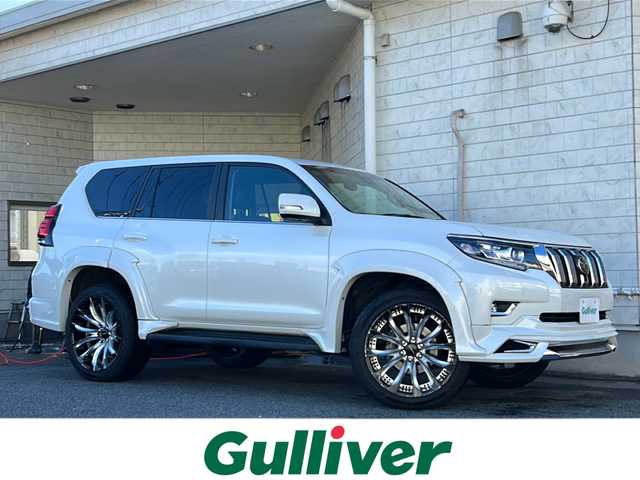 トヨタ ランドクルーザー プラド TX Lパッケージ 神奈川県 2022(令4)年 4.7万km ホワイトパールクリスタルシャイン ワンオーナー/サンルーフ/純正メーカーナビ(AM/FM/USB/BT/Miracast)/全方位カメラ/WALD スポイラー(F/S/R)/WALD 22インチアルミホイール/衝突被害軽減ブレーキ/レーンキープアシスト/ブラインドスポットモニター/クリアランスソナー/オートハイビーム/レーダークルーズコントロール/黒革シート/D/N席パワーシート/D/N席シートヒーター・エアコン/ビルトインETC2.0/ISOFIX/スペアキー×1/保証書/取扱説明書