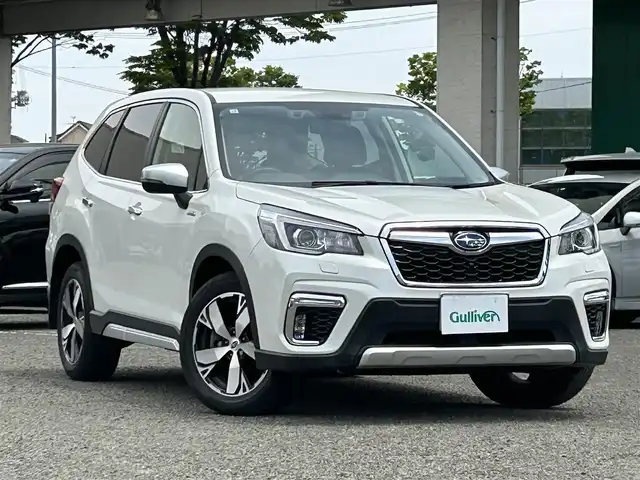 スバル フォレスター ハイブリッド アドバンス 宮城県 2019(令1)年 1.8万km クリスタルホワイトP ワンオーナー/純正ナビ/TV(フルセグ)/AM・FM/Bluetooth/CD・DVD/USB/WiFi/SD/ドラレコ前/パワーシートDN/ユーティリティフック/デジタルインナーミラー/パドルシフト/車外カメラF/S/B/X MODE/アイサイト/プリクラッシュブレーキ/AVH/車線維持/車線逸脱警報/後側方警戒支援システム/ステアリング連動ヘッドランプ/レーダークルーズコントロール/スリップ表示灯/横滑り防止